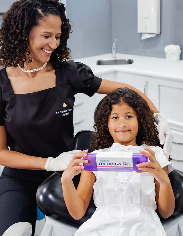Dr Karen welcoming a young patient